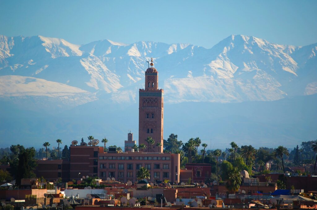 A breathtaking view of Moroccan landscapes with mountains, deserts, and traditional architecture